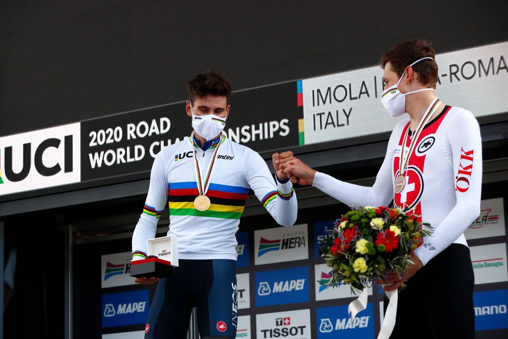 IMOLA ITALY SEPTEMBER 25 Podium Filippo Ganna of Italy Gold medal World Champion Jersey Stefan Kung of Switzerland Bronze medal Celebration Mask Covid Safety Measures Social distancing during the 93rd UCI Road World Championships 2020 Men Elite Individual Time Trial a 317km race from Imola to Imola Autodromo Enzo e Dino Ferrari ITT ImolaEr2020 Imola2020 on September 25 2020 in Imola Italy Photo by Bas CzerwinskiGetty Images