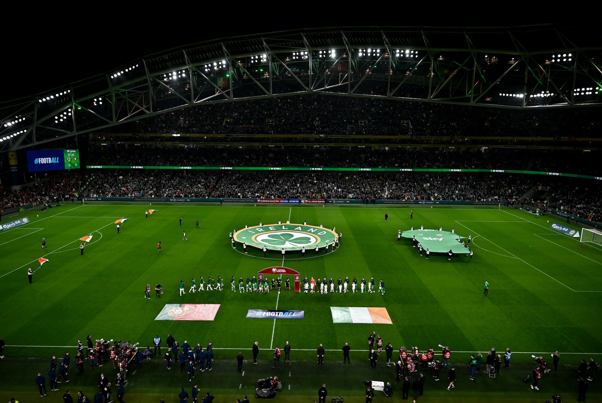 Republic of Ireland and Portugal teams make their way onto the pitch before the FIFA World Cup 2026 Group F Qualifier match between Republic of Ireland and Portugal at the Aviva Stadium in Dublin