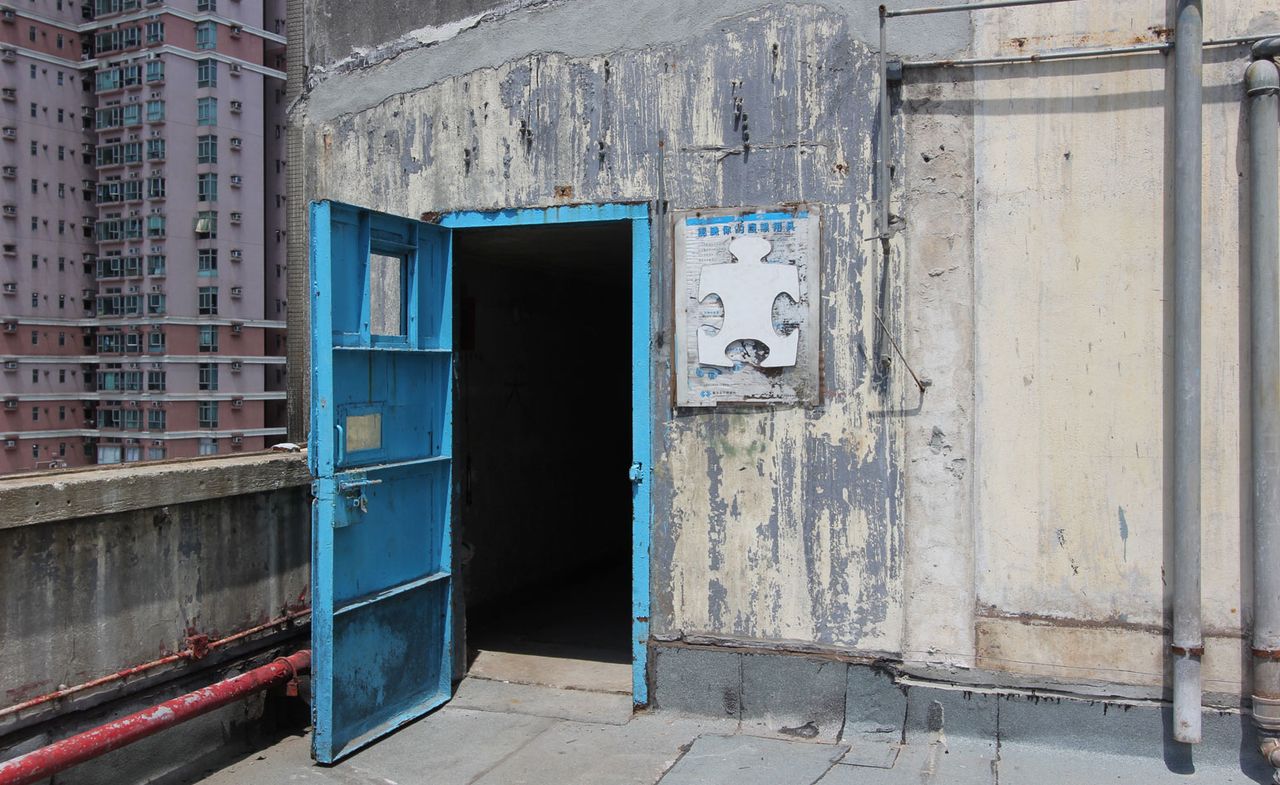 building terrace with blue door