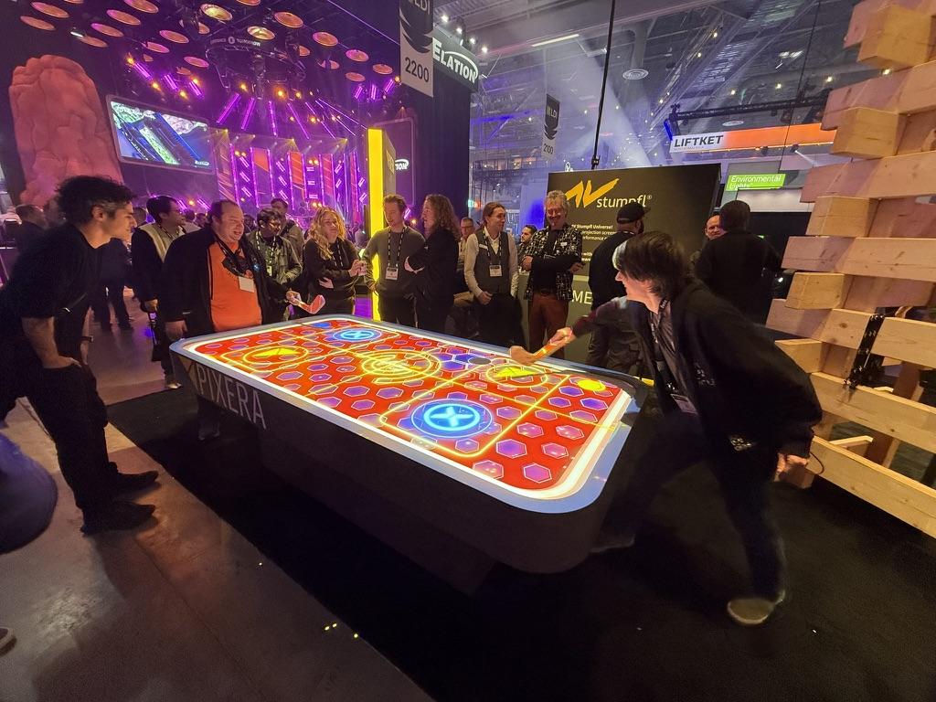 Live digital art projection of an air hockey table