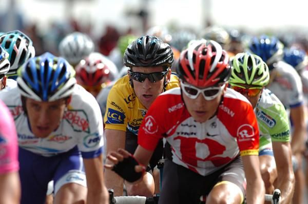 Race leader Bradley Wiggins (Sky Procycling) sits tucked into the peloton