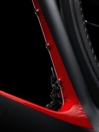The triple bottle bolts on the seat tube