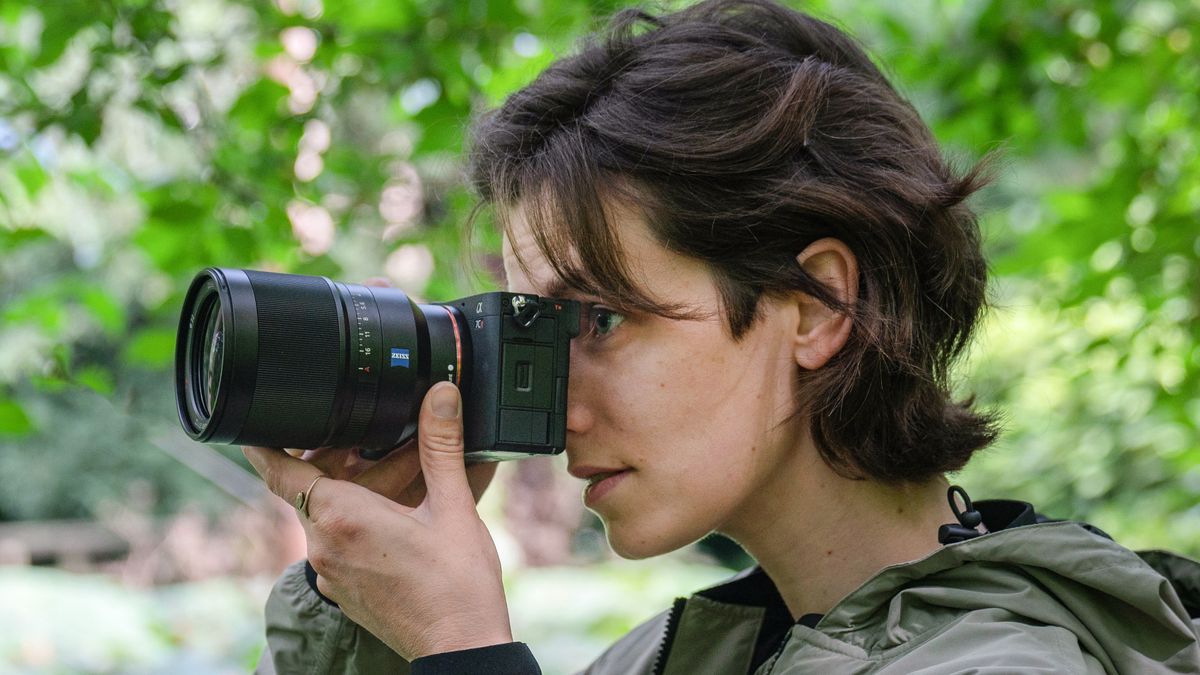 Sony A7CR being used by a female photographer outdoors