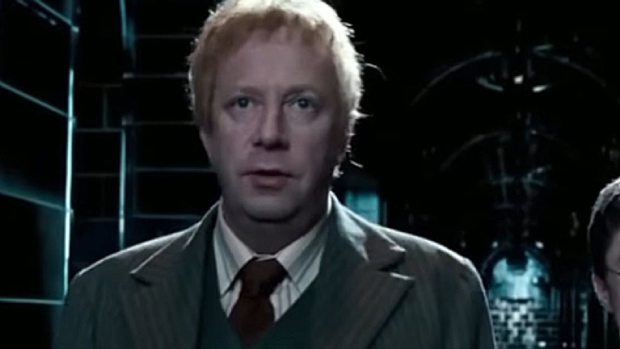 Arthur Weasley looking down a hallway in Harry Potter and the Order of Phoenix.