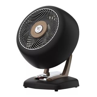 Circular black and silver space heater