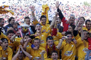 Steaua Bucharest players celebrate winning the Romanian league title in June 2005.