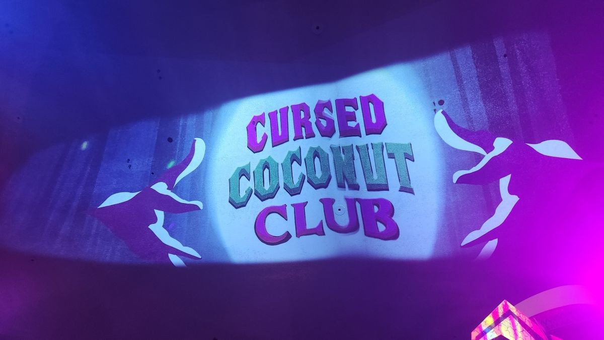 Cursed Coconut Club signage