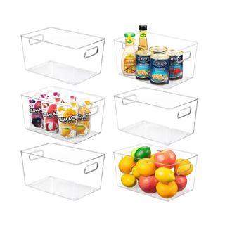 Clear storage baskets with food in them
