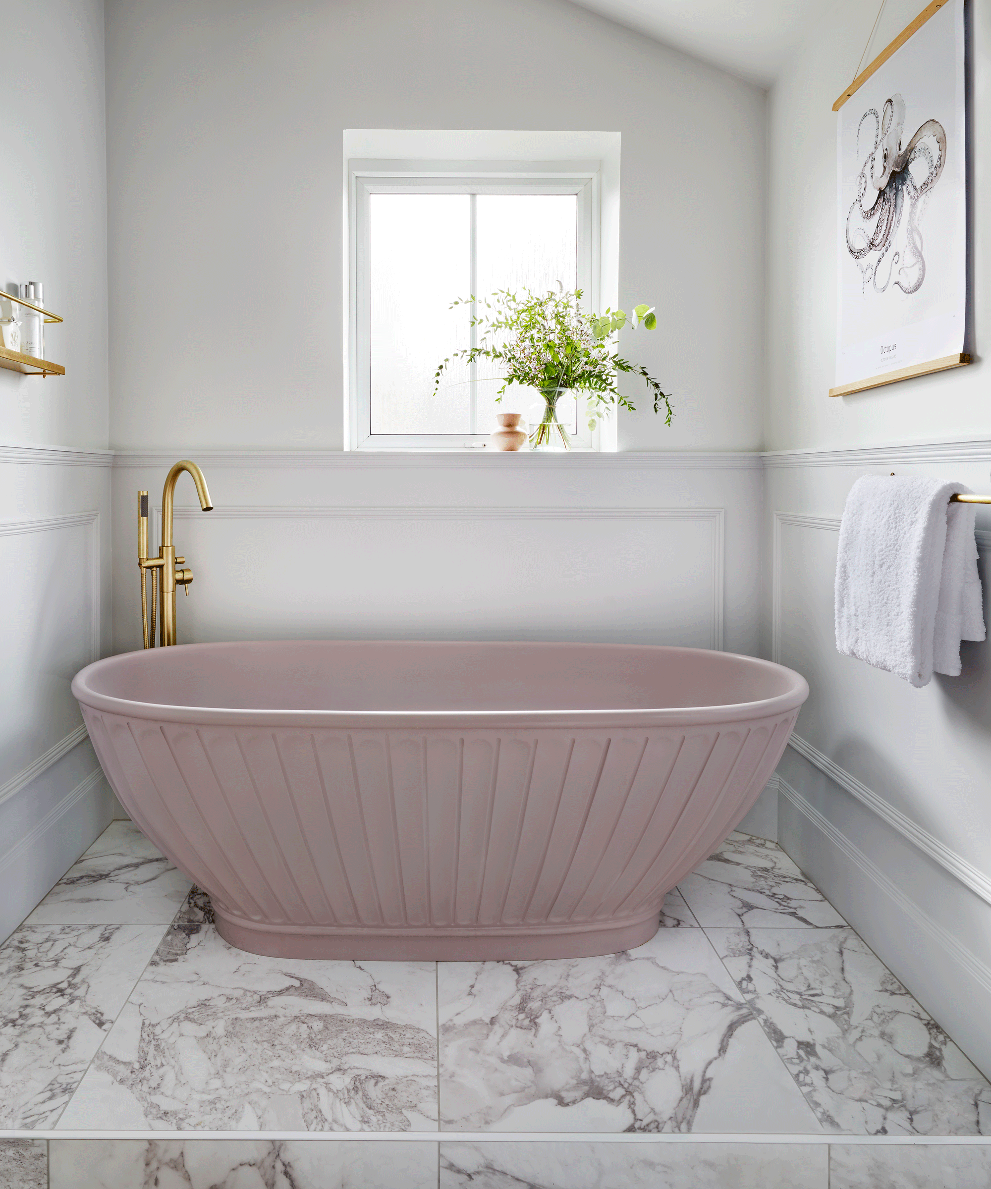 Bathroom with pink bath and marble flooring