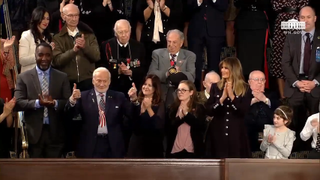 Former NASA astronaut Buzz Aldrin gives two thumbs up after President Donald J. Trump gave him a shout-out during his annual State of the Union address on Feb. 5, 2019.