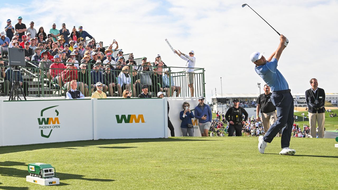 Scottie Scheffler takes a tees off on the first hole at the WM Phoenix Open