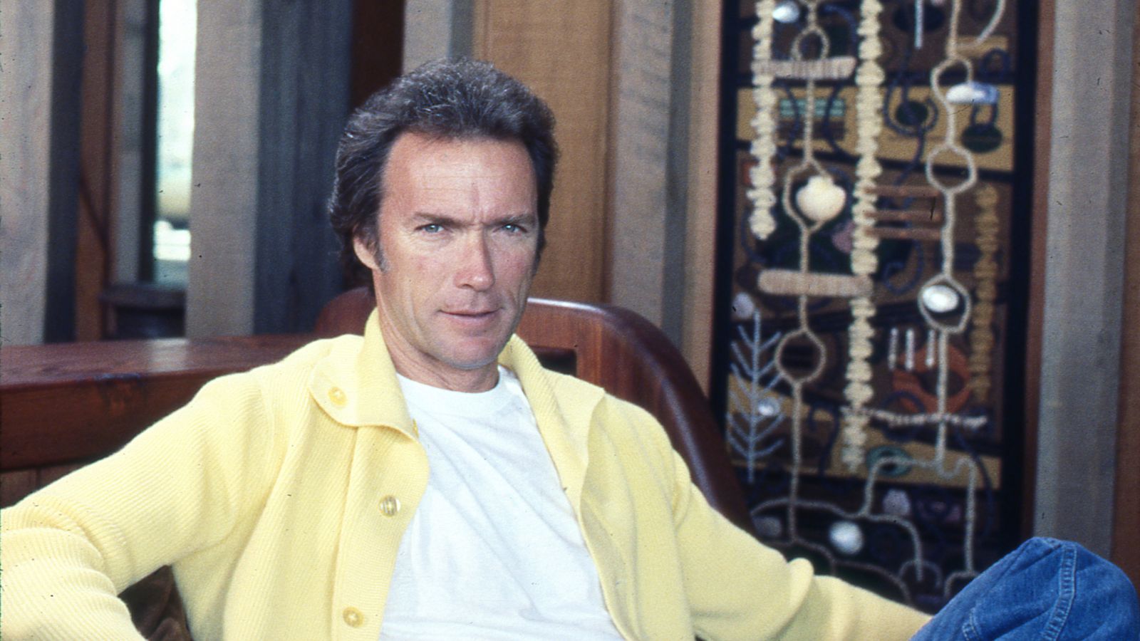 clint eastwood on a brown background