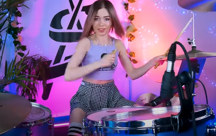 A still from Anastasia Sereda&#039;s video for her drum cover of Slipknot&#039;s Wait and Bleed