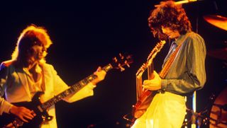 (from left) Led Zeppelin's John Paul Jones and Jimmy Page perform onstage in Knebworth, England on August 11, 1979