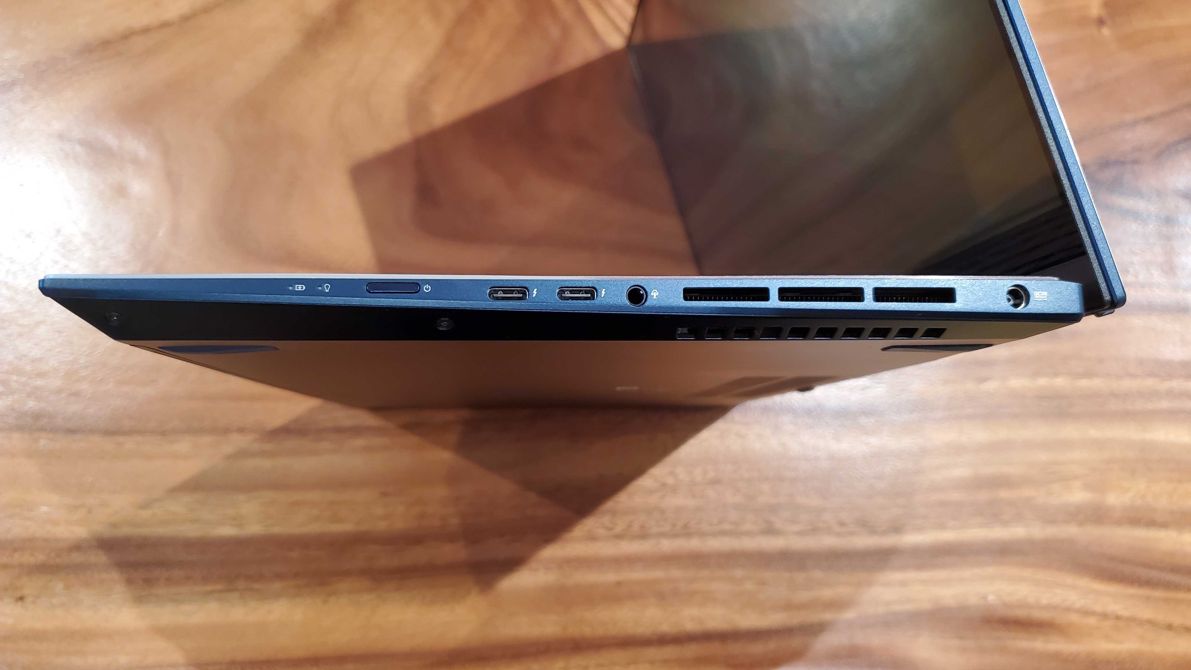 side view of a dark blue laptop