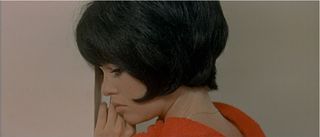 The use of colour in the film carries strong symbolism, with red standing out in various moments, such as in Bardot’s clothing