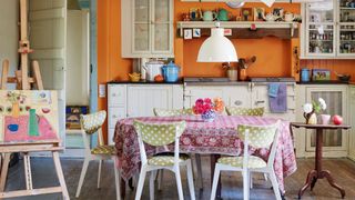 orange kitchen walls in converted cow byre home