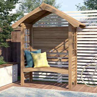 Wooden arbour on a deck