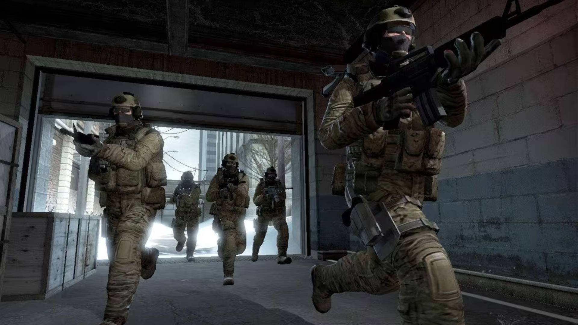A group of soldiers in full gear enter a warehouse