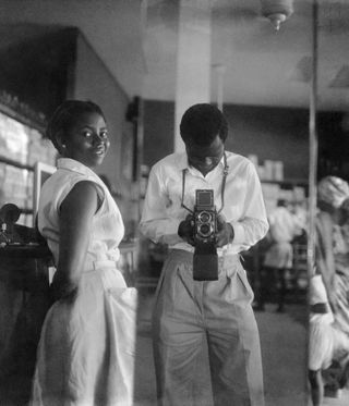 Black and white photograph of a couple, from the book Voices: Ghana’s artists in their own words, from Manju Journal
