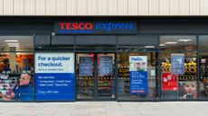 Entrance to the Tesco Express supermarket grocery store in Holborn, London