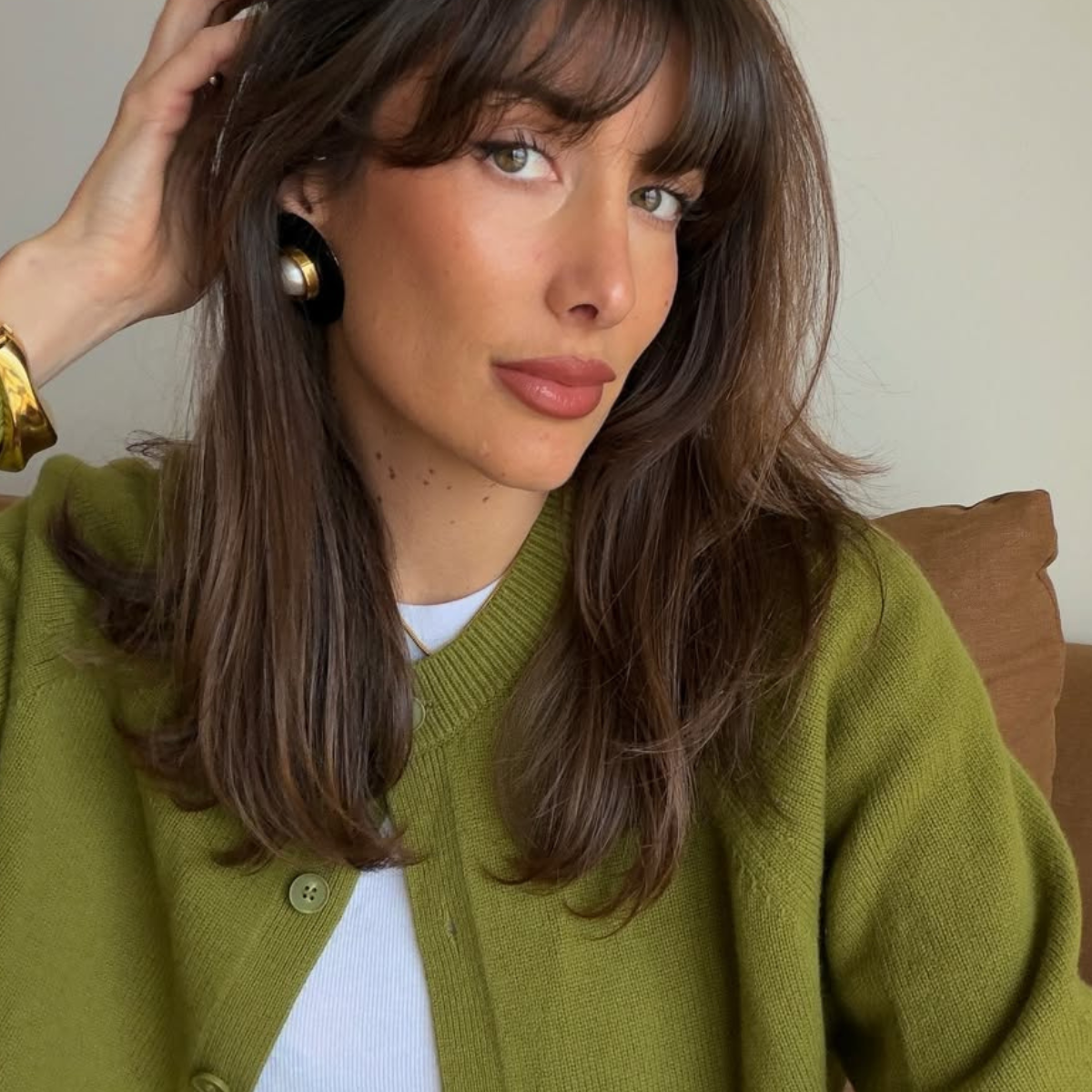 Julie in a green cardigan