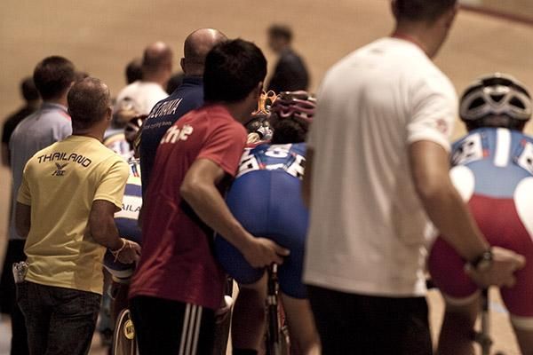 Handlers with their riders before another leg of the women's omnium, this time the elimination race.