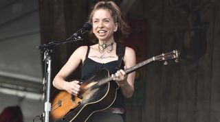 Ani DiFranco performs during the 2019 New Orleans Jazz & Heritage Festival 50th Anniversary at Fair Grounds Race Course on May 03, 2019 in New Orleans, Louisiana.