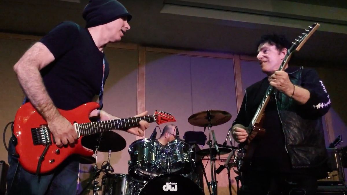 Watch Joe Satriani and Neal Schon Jam on Jimi Hendrix’s “Red House” Guitar World