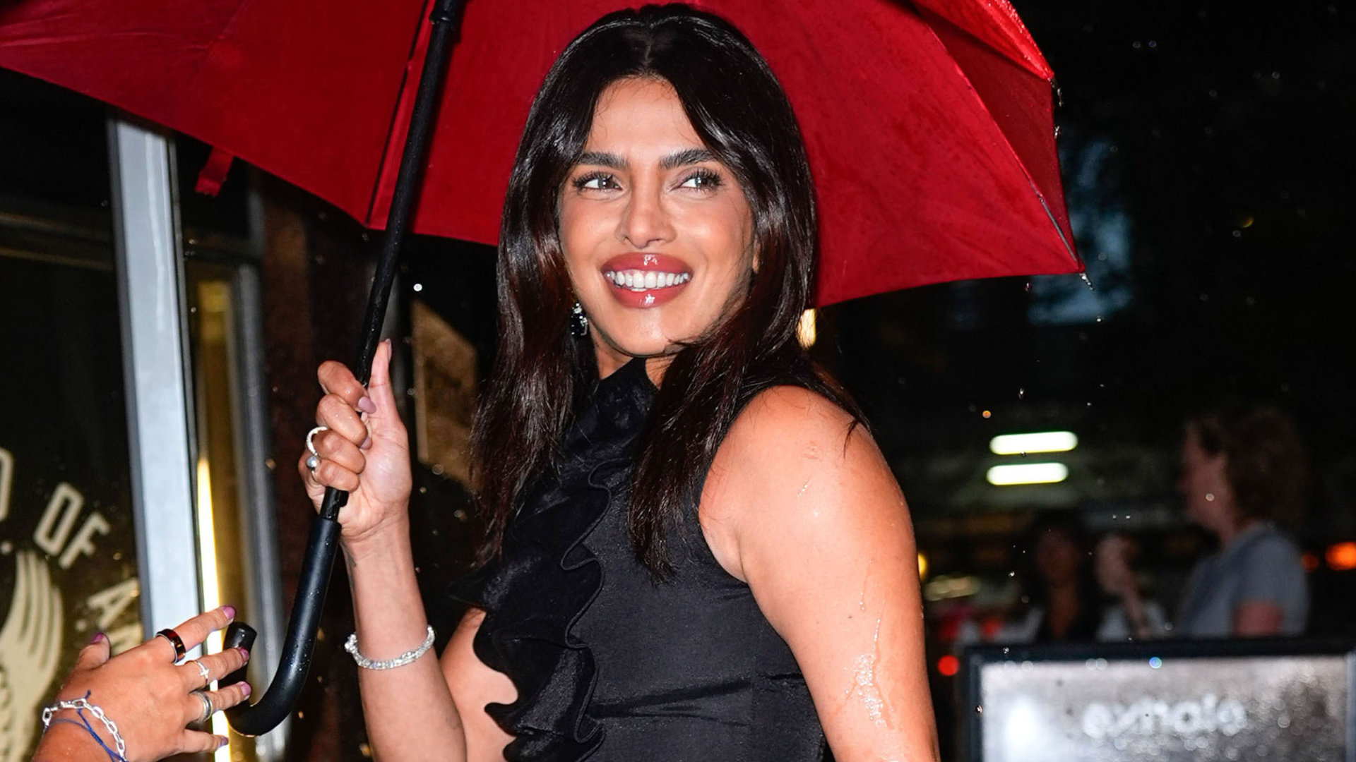 Priyanka Chopra attended the 'Cycle of Love' premiere in a textured little black dress and a Dior Bag