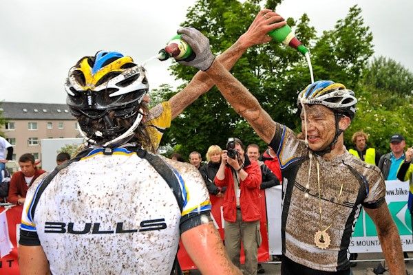 Team Bulls celebrates the overall win of its leader Thomas Dietsch with champagne.