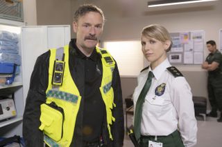 Bloods: Julian Barratt as the haunted-looking Lawrence and Lucy Punch as officious Jo
