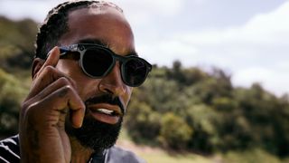 Official lifestyle shots of a person wearing Oakley Meta HSTN smart glasses