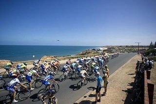 The peloton makes its way along the stunning coast through Snapper Point.