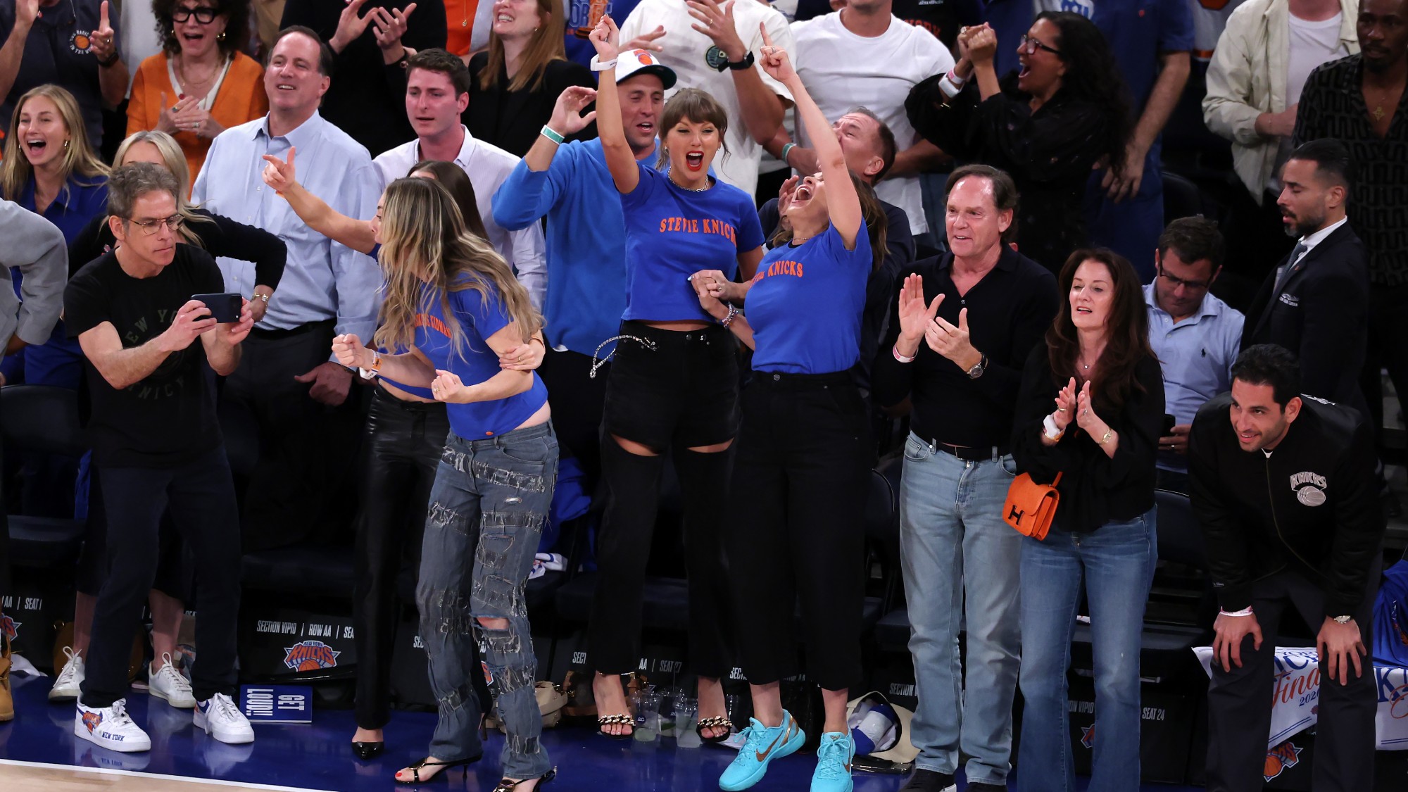Ben Stiller, Este Haim, Taylor Swift, and Mariska Hargitay react during the fourth quarter in Game Four of the 2026 NBA Finals between the San Antonio Spurs and the New York Knicks at MSG