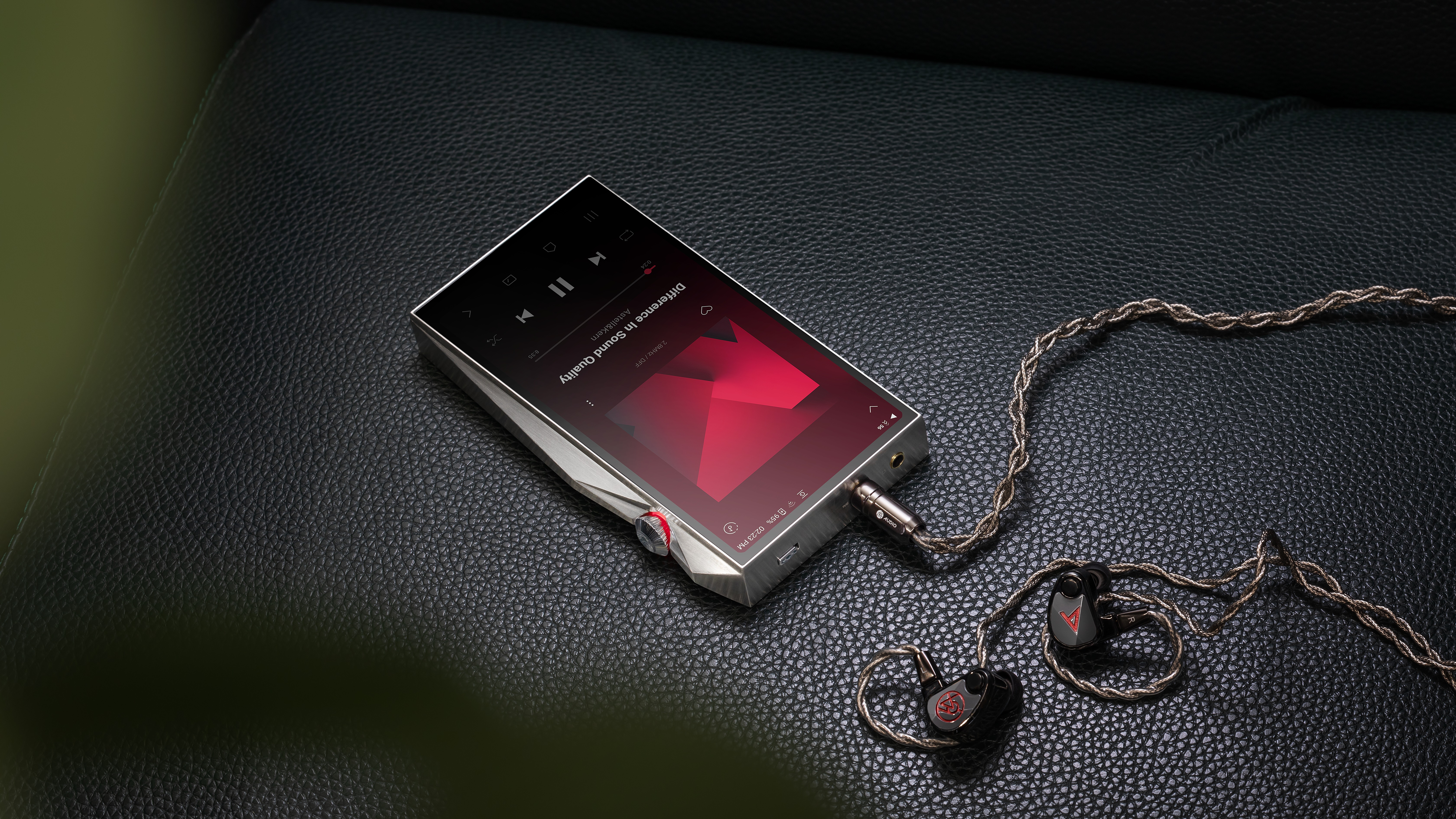 Astell &amp;amp; Kern SP4000T portable music player with a red display