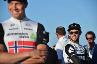 Mark Cavendish looks on as Edvald Boasson Hagen prepares for the podium