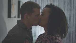 Max and Donna kiss passionately.