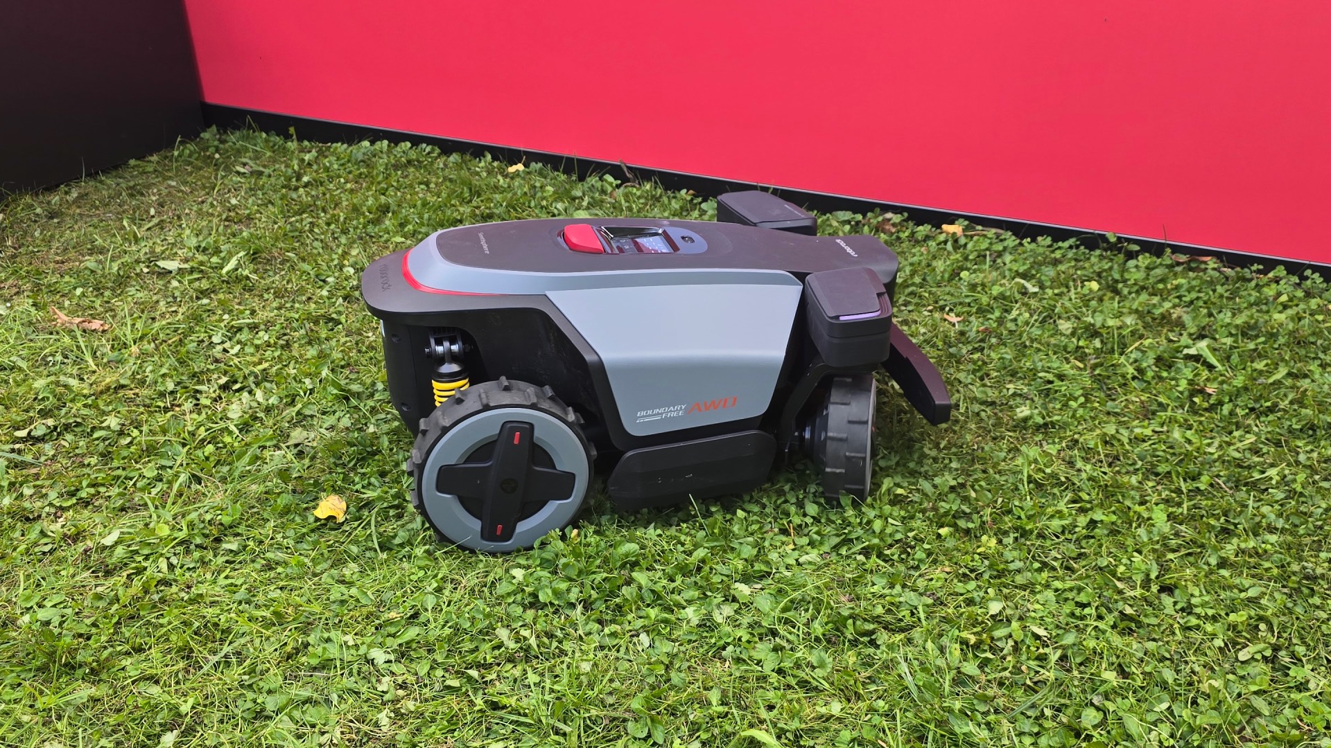 RockMow Z1 robot lawn mower turning a corner