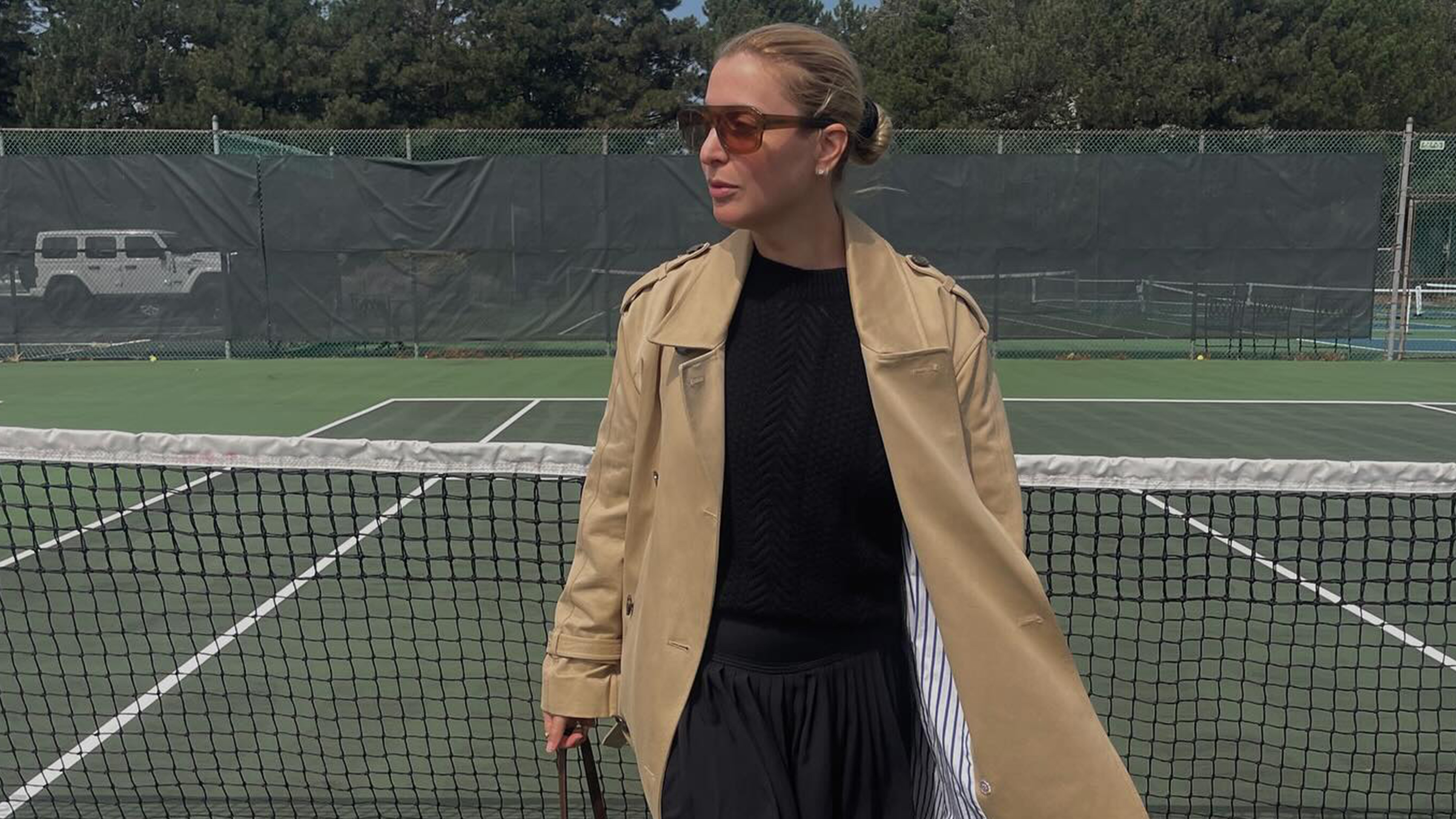 Kerry Pieri wearing a trench coat.