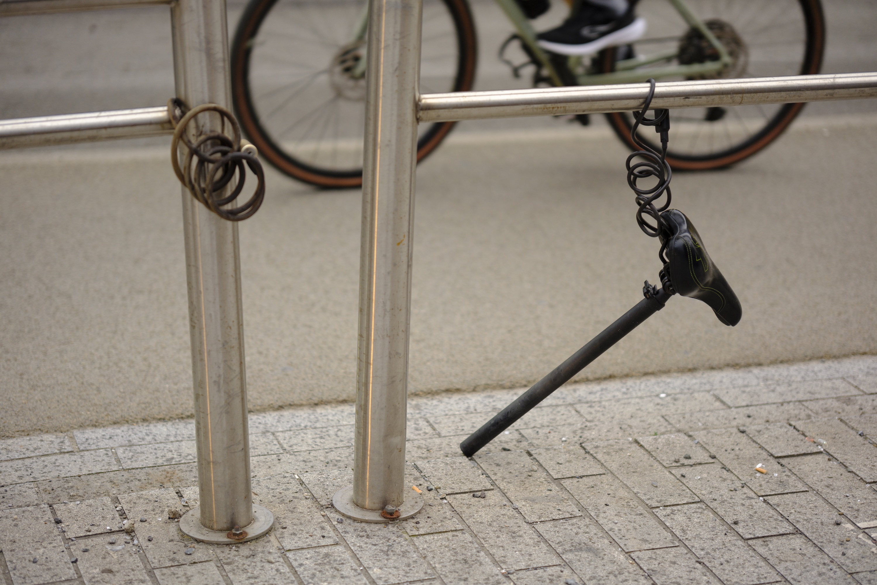 A bicycle seat and the frame tube locked with a cable are the only remnants of a bike stolen on Rue de la Loi, in the heart of the European Quarter on May 4 2026 in Brussels, Belgium