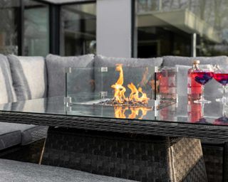 outdoor fire pit table by Luxury Rattan