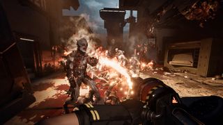 Killing Floor 3 gameplay screenshot showing the player melting zombies with a flamethrower in gory detail