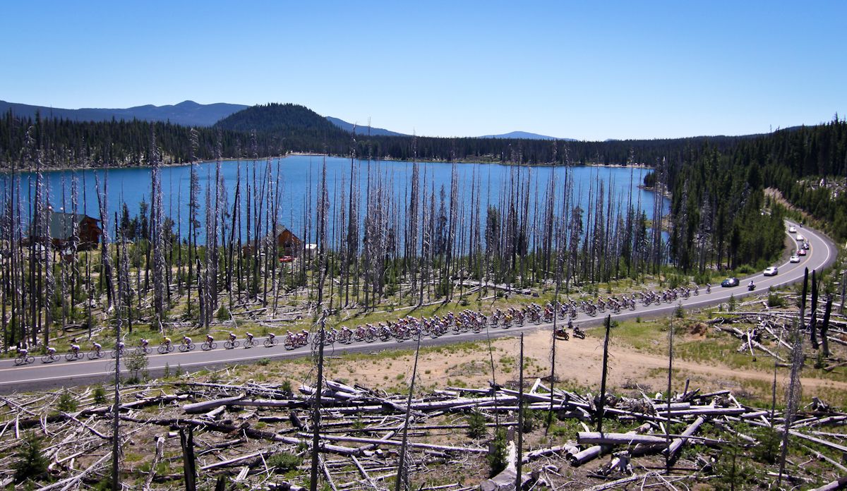 The Cascade Classic peloton passes one of the namesake lakes on the Cascade Lakes stage