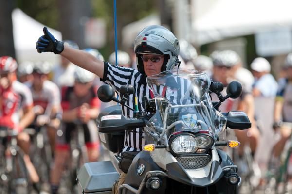 USAC moto ref Greg Peart gives the go-ahead to start racing at the Sacramento Grand Prix.