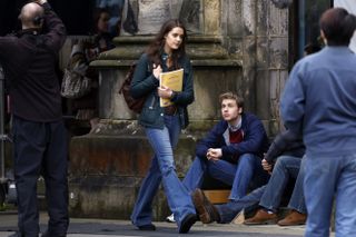 Actor Ed McVey, as Prince William and actress Meg Bellamy who plays Kate Middleton are seen during filming for the next season of The Crown on March 17, 2023 in St Andrews, Scotland.