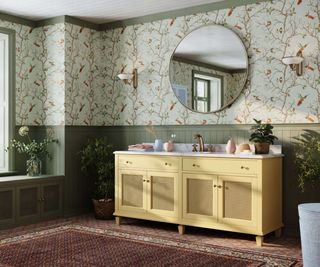 bathroom with green floral wallpaper, half panelled green wall and large double yellow vanity unit