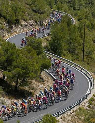 The peloton winds its way through the Spanish countryside.