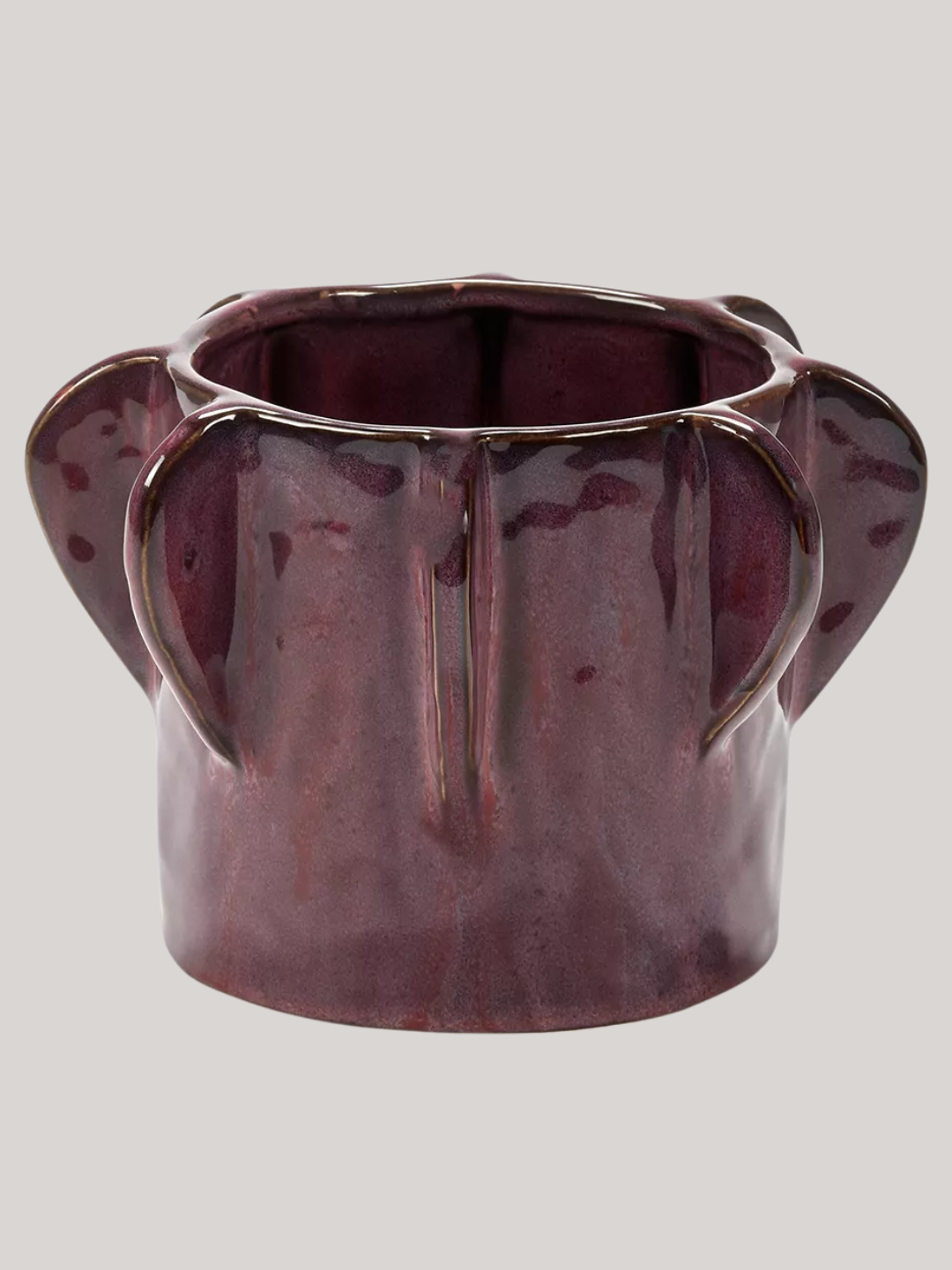 A textured glossy purple planter from SERAX