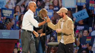 Eminem introduces former president Barack Obama during a rally to supporters of Vice President Kamala Harris 2024 presidential run